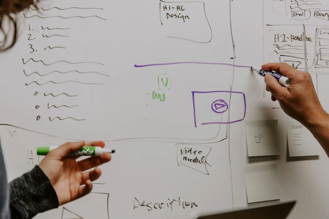 Vue plongeante sur des graphiques et un smartphone dans un bureau, mettant en avant l’analyse de données.